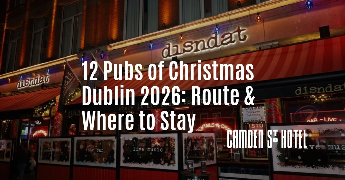 Festive pub exterior at night near Camden St Hotel, vibrant lights, music venue; perfect Dublin Christmas stay.